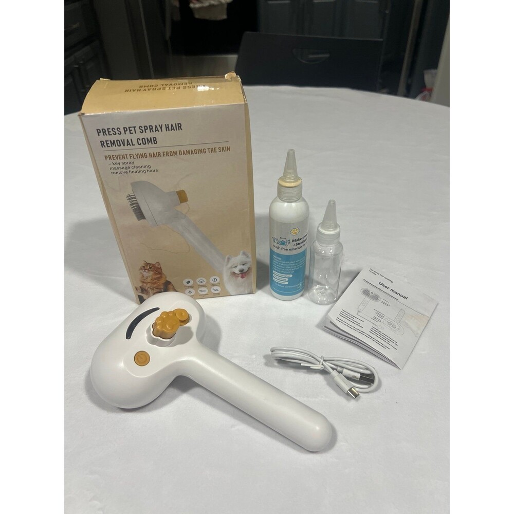 Pet spray hair removal comb